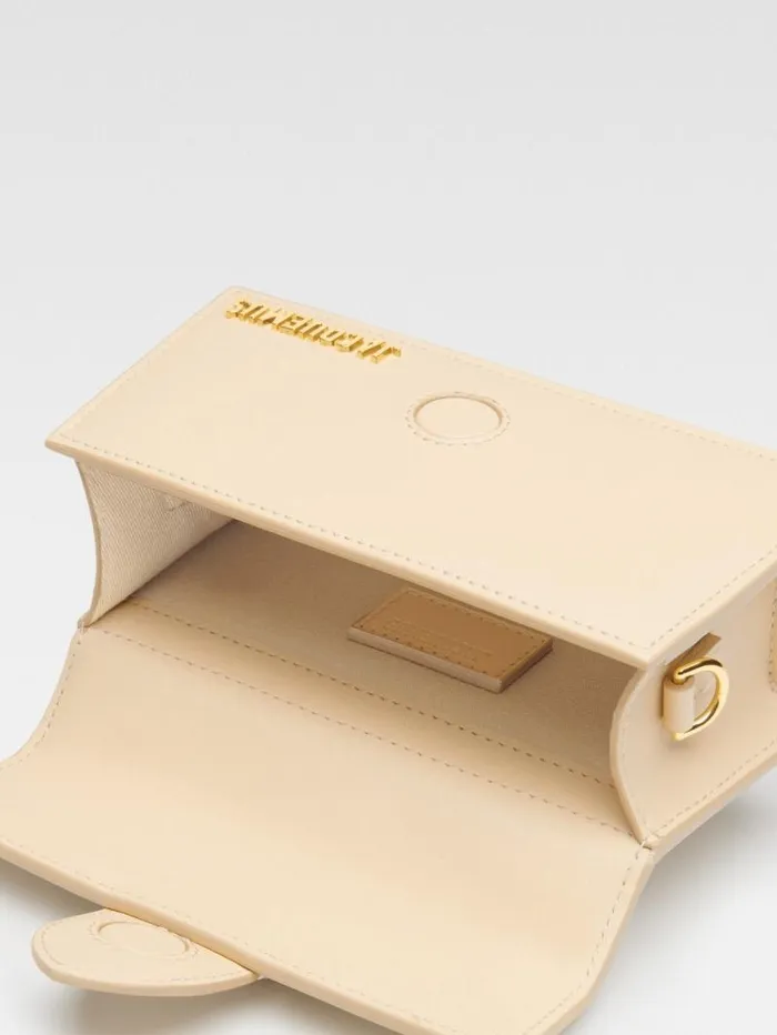 JACQUEMUS The Bambino Ivory Women Crossbody and Handbags JACQUEMUS The Bambino Ivory Women Crossbody and Handbags