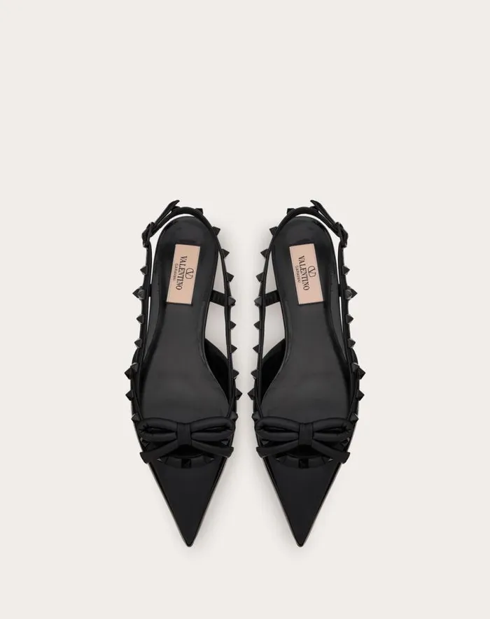 Valentino Ballerinas Woman Rockstud Bow Slingback Ballerina In Patent Leather With Toneontone Studs For Woman In Black Black