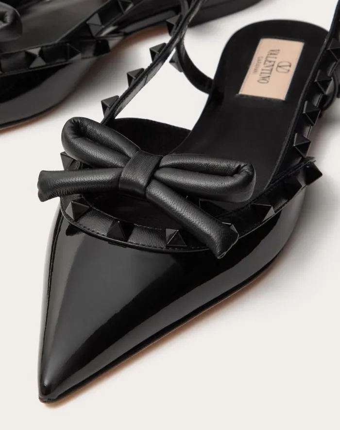 Valentino Ballerinas Woman Rockstud Bow Slingback Ballerina In Patent Leather With Toneontone Studs For Woman In Black Black