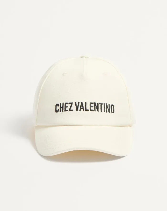 Valentino Hats And Gloves Woman Chez Valentino Cotton Baseball Cap For Woman In Blackivory Blackivory Valentino Hats And Gloves Woman Chez Valentino Cotton Baseball Cap For Woman In Blackivory Blackivory