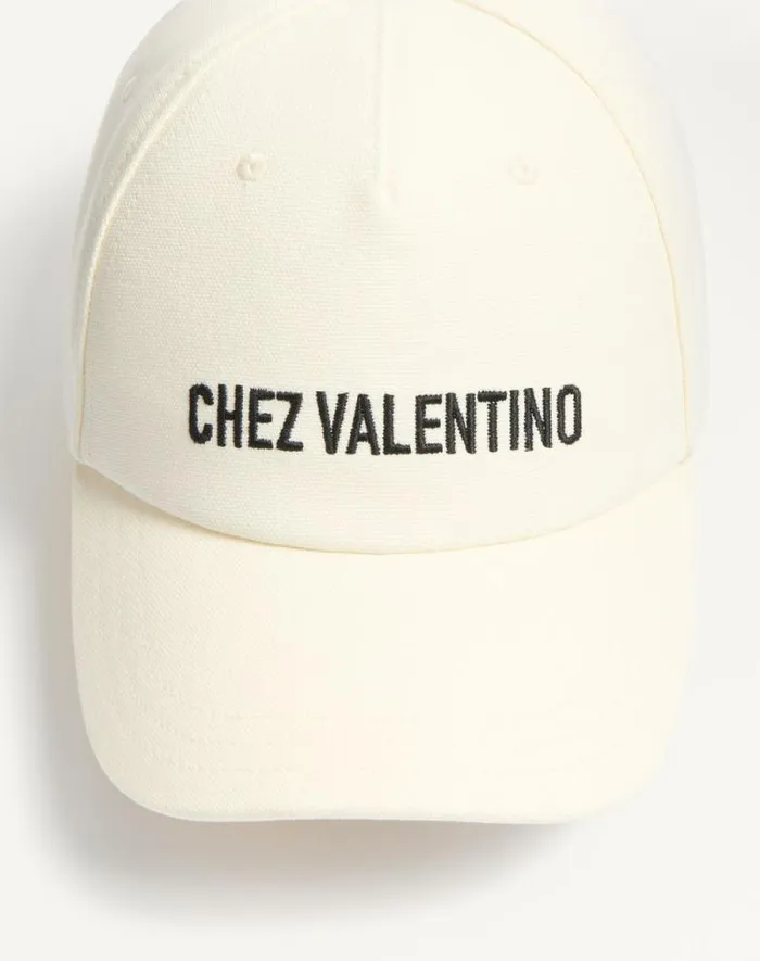 Valentino Hats And Gloves Woman Chez Valentino Cotton Baseball Cap For Woman In Blackivory Blackivory Valentino Hats And Gloves Woman Chez Valentino Cotton Baseball Cap For Woman In Blackivory Blackivory