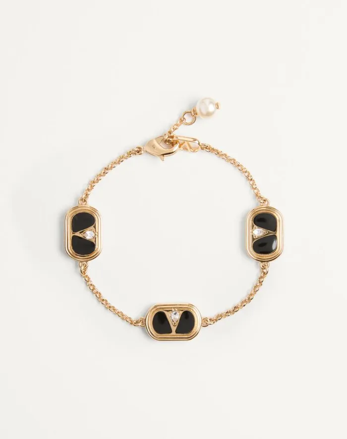 Valentino Jewelry Woman Oval Bracelet In Metal Enamel Crystals And Swarovski Pearl For Woman In Goldblackcrystalcream Goldblackcrystalcream Valentino Jewelry Woman Oval Bracelet In Metal Enamel Crystals And Swarovski Pearl For Woman In Goldblackcrystalcream Goldblackcrystalcream