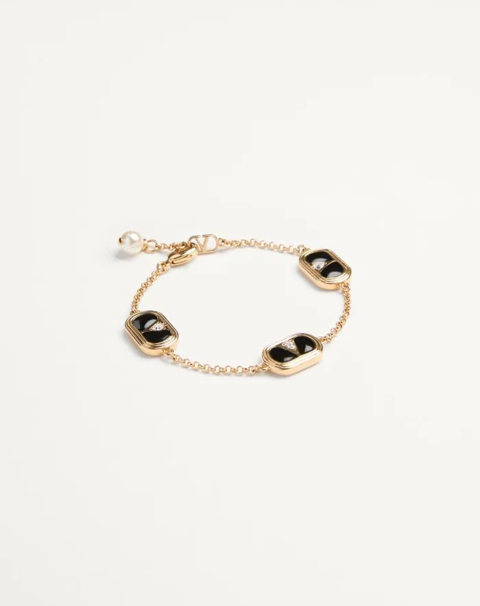 Valentino Jewelry Woman Oval Bracelet In Metal Enamel Crystals And Swarovski Pearl For Woman In Goldblackcrystalcream Goldblackcrystalcream Valentino Jewelry Woman Oval Bracelet In Metal Enamel Crystals And Swarovski Pearl For Woman In Goldblackcrystalcream Goldblackcrystalcream