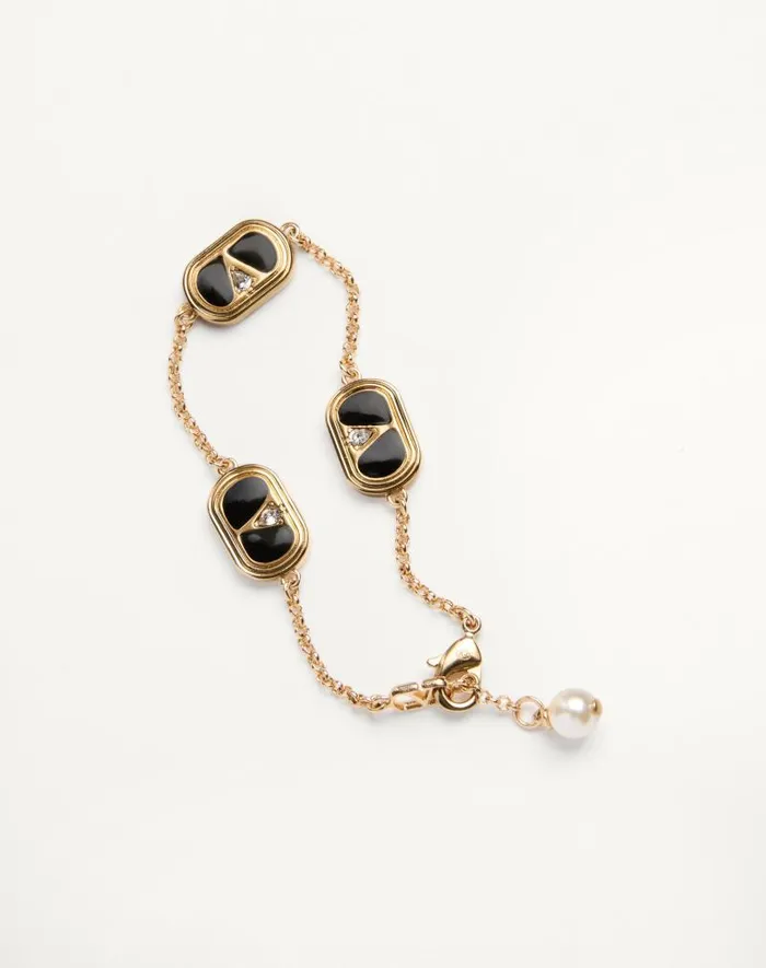 Valentino Jewelry Woman Oval Bracelet In Metal Enamel Crystals And Swarovski Pearl For Woman In Goldblackcrystalcream Goldblackcrystalcream Valentino Jewelry Woman Oval Bracelet In Metal Enamel Crystals And Swarovski Pearl For Woman In Goldblackcrystalcream Goldblackcrystalcream