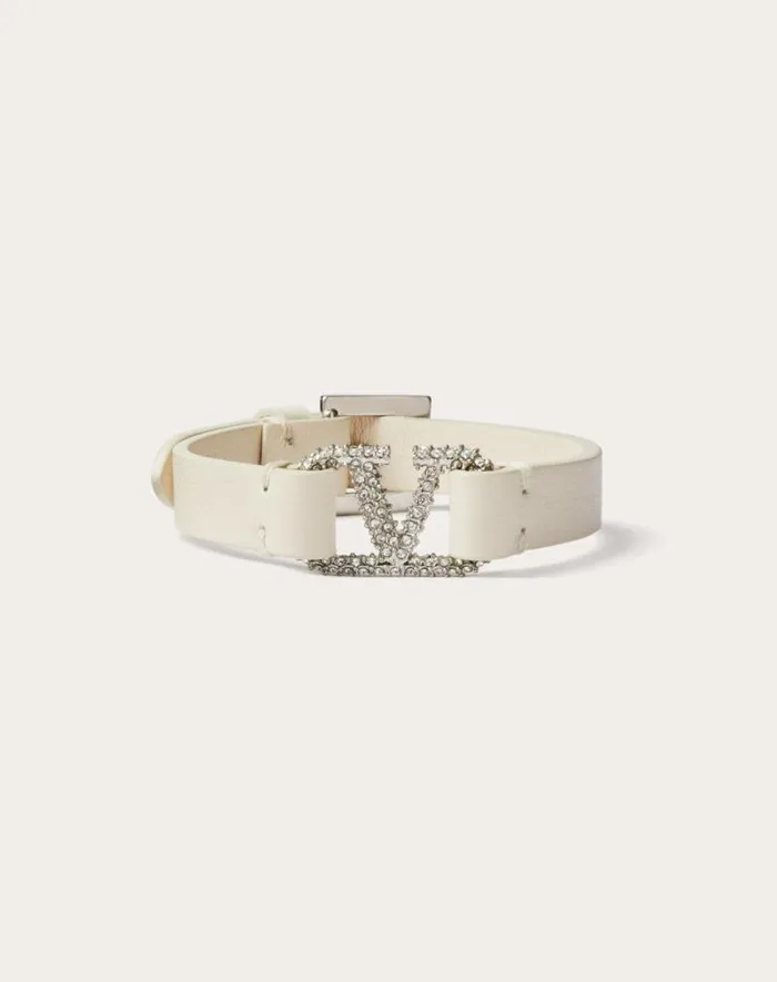 Valentino Jewelry Woman Valentino Garavani Vlogo Signature Leather And Crystal Bracelet For Woman In Light Ivory Light Ivory Valentino Jewelry Woman Valentino Garavani Vlogo Signature Leather And Crystal Bracelet For Woman In Light Ivory Light Ivory