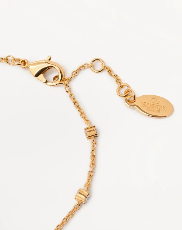 Valentino Jewelry Woman Vlogo Signature Metal And Swarovski Crystal Bracelet For Woman In Goldsilver Goldsilver Valentino Jewelry Woman Vlogo Signature Metal And Swarovski Crystal Bracelet For Woman In Goldsilver Goldsilver
