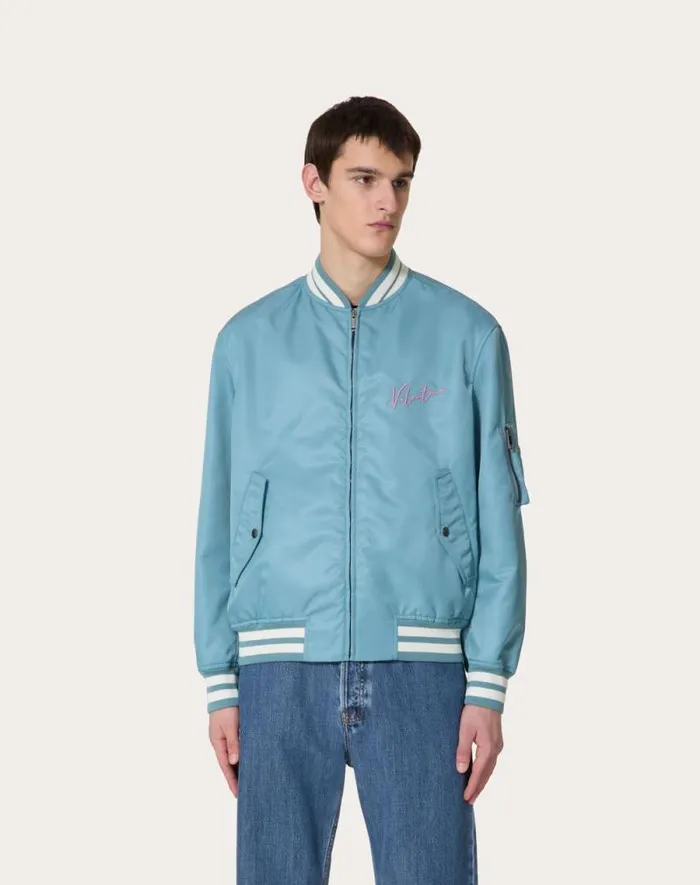 Valentino Outerwear Man Nylon Bomber Jacket With Valentino Embroidery And Vlogo Signature Print For Man In Stone Stone Valentino Outerwear Man Nylon Bomber Jacket With Valentino Embroidery And Vlogo Signature Print For Man In Stone Stone