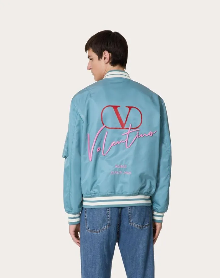 Valentino Outerwear Man Nylon Bomber Jacket With Valentino Embroidery And Vlogo Signature Print For Man In Stone Stone Valentino Outerwear Man Nylon Bomber Jacket With Valentino Embroidery And Vlogo Signature Print For Man In Stone Stone