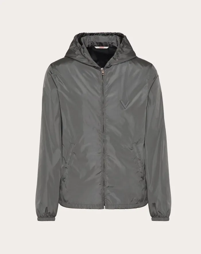 Valentino Outerwear Man Nylon Hooded Windbreaker With Metallic V Detail For Man In Grey Grey Valentino Outerwear Man Nylon Hooded Windbreaker With Metallic V Detail For Man In Grey Grey