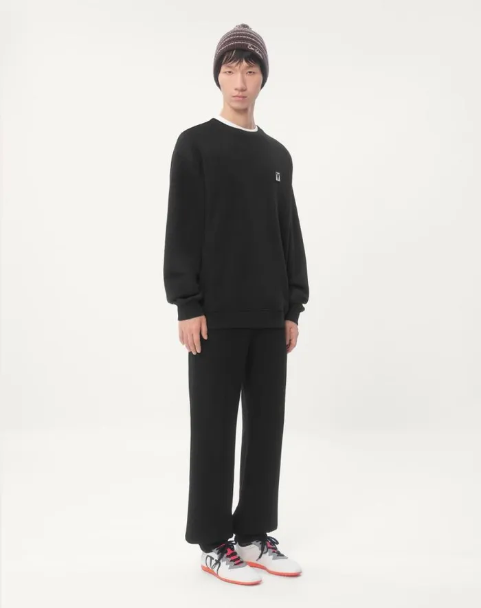 Valentino Pants And Shorts Man Cotton Jogging Pants With Chez Valentino Patch For Man In Black Black Valentino Pants And Shorts Man Cotton Jogging Pants With Chez Valentino Patch For Man In Black Black