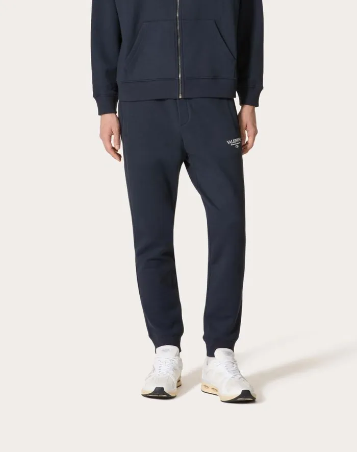 Valentino Pants And Shorts Man Cotton Jogging Pants With Valentino Print For Man In Navywhite Navywhite Valentino Pants And Shorts Man Cotton Jogging Pants With Valentino Print For Man In Navywhite Navywhite