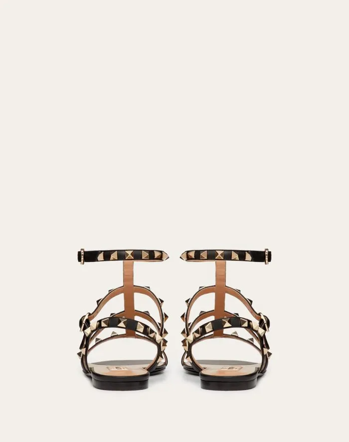 Valentino Sandals Woman Rockstud Flat Calfskin Sandal With Straps For Woman In Azure Azure Valentino Sandals Woman Rockstud Flat Calfskin Sandal With Straps For Woman In Azure Azure