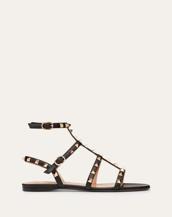 Valentino Sandals Woman Rockstud Flat Calfskin Sandal With Straps For Woman In Black Black Valentino Sandals Woman Rockstud Flat Calfskin Sandal With Straps For Woman In Black Black