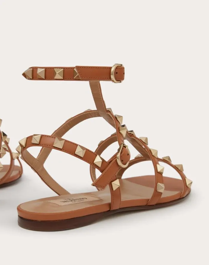Valentino Sandals Woman Rockstud Flat Calfskin Sandal With Straps For Woman In Black Black Valentino Sandals Woman Rockstud Flat Calfskin Sandal With Straps For Woman In Black Black