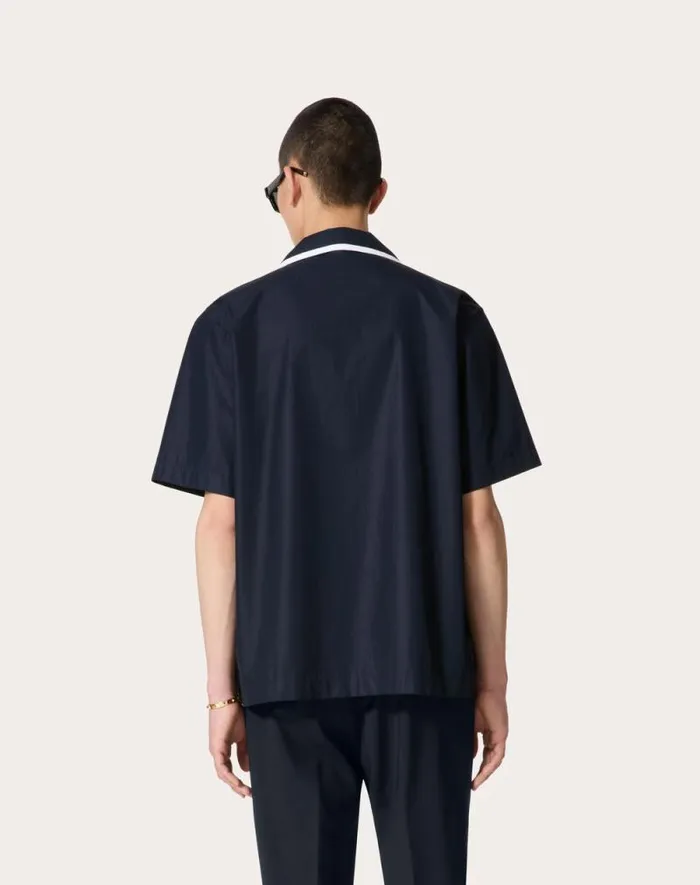 Valentino Shirts Man Cotton Poplin Bowling Shirt With Rubberized V Detail For Man In White White Valentino Shirts Man Cotton Poplin Bowling Shirt With Rubberized V Detail For Man In White White