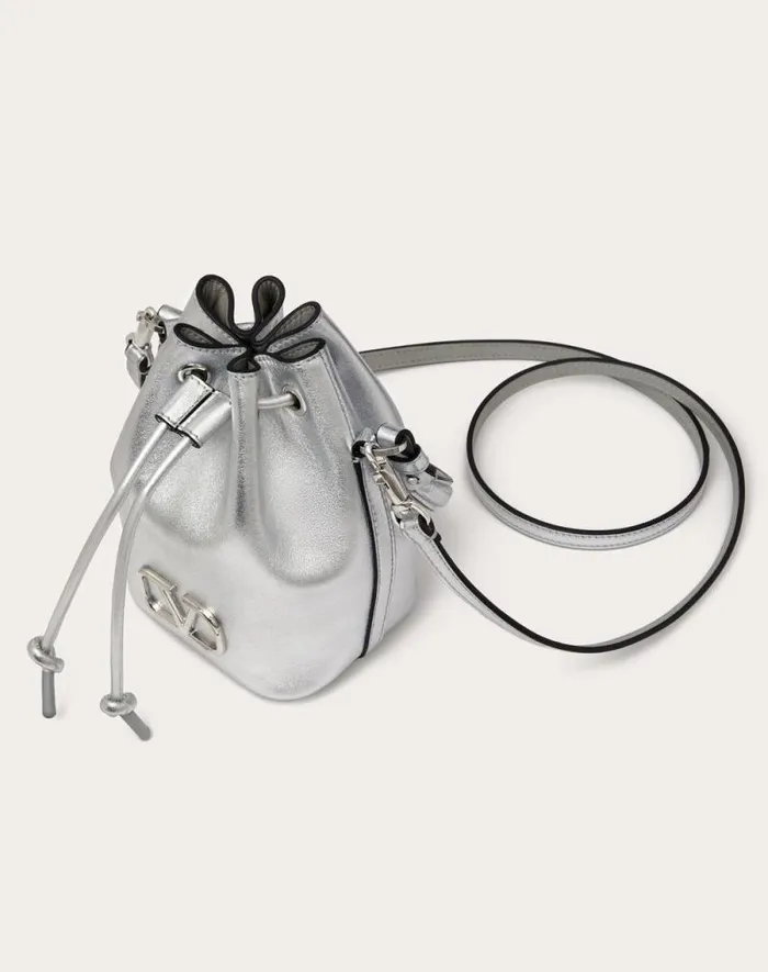 Valentino Shoulder Bags Woman Mini Vlogo Signature Bucket Bag In Metallic Nappa Leather For Woman In Silver Silver Valentino Shoulder Bags Woman Mini Vlogo Signature Bucket Bag In Metallic Nappa Leather For Woman In Silver Silver