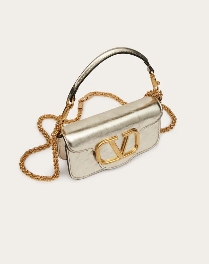 Valentino Shoulder Bags Woman Small Valentino Garavani Loc Metallic Calfskin Shoulder Bag For Woman In Platinum Platinum Valentino Shoulder Bags Woman Small Valentino Garavani Loc Metallic Calfskin Shoulder Bag For Woman In Platinum Platinum