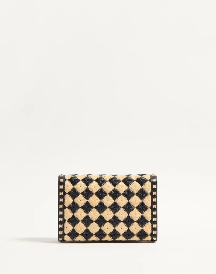 Valentino Shoulder Bags Woman Valentino Garavani Rockstud Small Shoulder Bag In Embroidered Synthetic Raffia For Woman In Naturalblack Naturalblack
