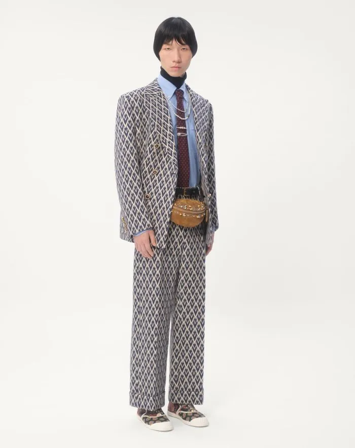 Valentino Suits Man Wool Pants With Cuffs With Toute La V Jacquard Pattern For Man In Nightcream Nightcream Valentino Suits Man Wool Pants With Cuffs With Toute La V Jacquard Pattern For Man In Nightcream Nightcream
