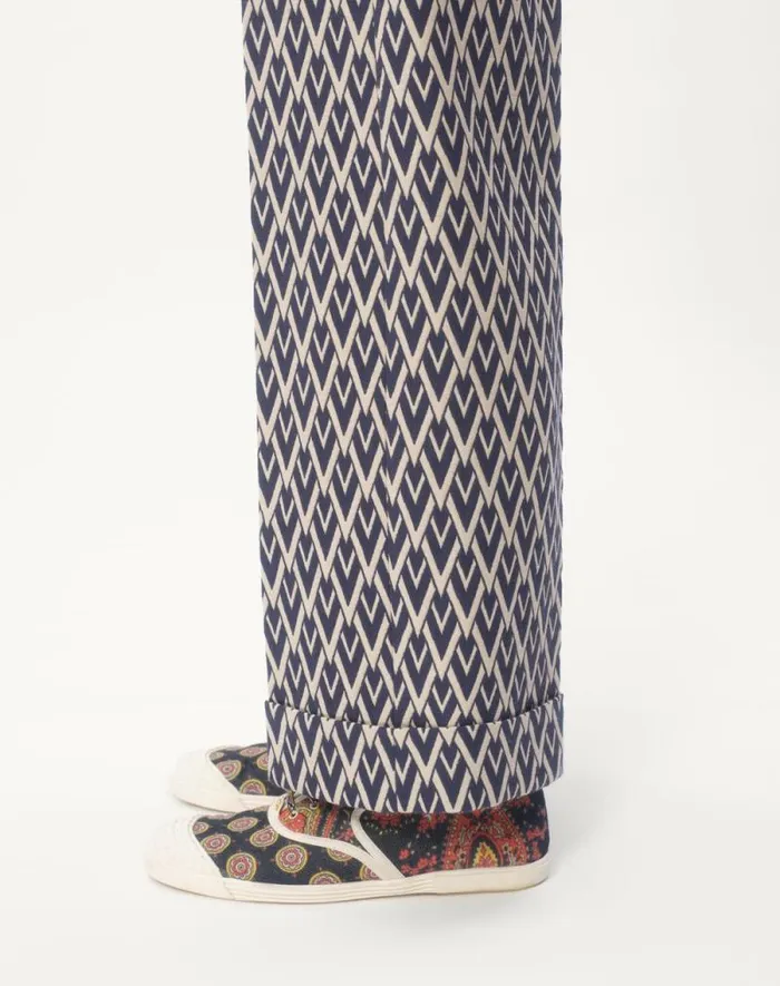 Valentino Suits Man Wool Pants With Cuffs With Toute La V Jacquard Pattern For Man In Nightcream Nightcream Valentino Suits Man Wool Pants With Cuffs With Toute La V Jacquard Pattern For Man In Nightcream Nightcream