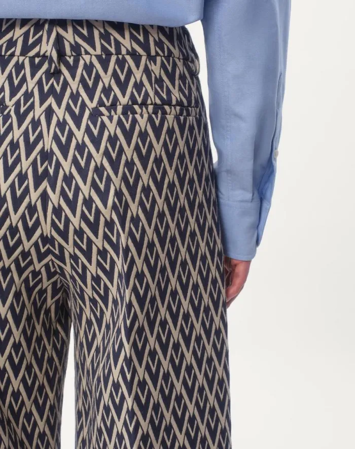 Valentino Suits Man Wool Pants With Cuffs With Toute La V Jacquard Pattern For Man In Nightcream Nightcream Valentino Suits Man Wool Pants With Cuffs With Toute La V Jacquard Pattern For Man In Nightcream Nightcream