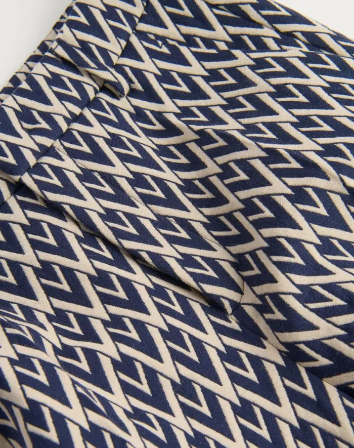 Valentino Suits Man Wool Pants With Cuffs With Toute La V Jacquard Pattern For Man In Nightcream Nightcream Valentino Suits Man Wool Pants With Cuffs With Toute La V Jacquard Pattern For Man In Nightcream Nightcream