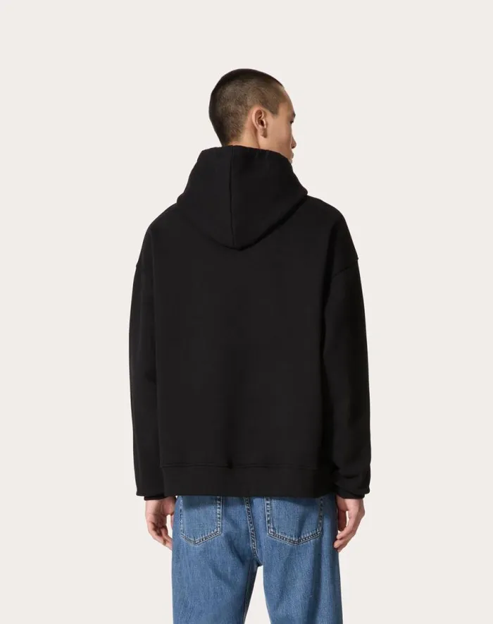 Valentino Tshirts And Sweatshirts Man Cotton Hooded Sweatshirt With Metallic V Detail For Man In Black Black Valentino Tshirts And Sweatshirts Man Cotton Hooded Sweatshirt With Metallic V Detail For Man In Black Black