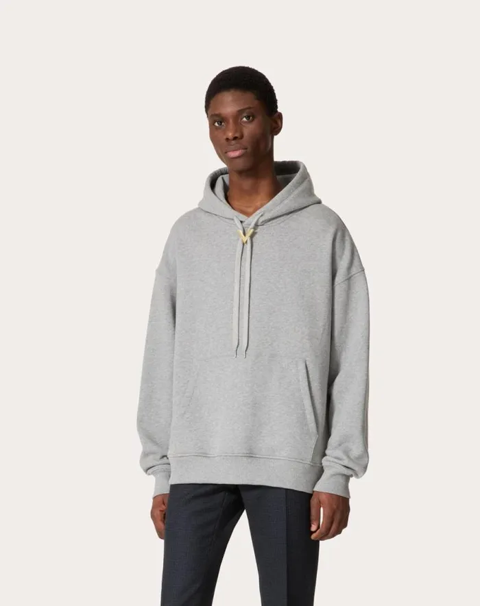 Valentino Tshirts And Sweatshirts Man Cotton Hooded Sweatshirt With Metallic V Detail For Man In Black Black Valentino Tshirts And Sweatshirts Man Cotton Hooded Sweatshirt With Metallic V Detail For Man In Black Black