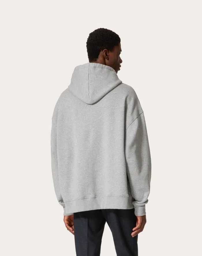 Valentino Tshirts And Sweatshirts Man Cotton Hooded Sweatshirt With Metallic V Detail For Man In Black Black Valentino Tshirts And Sweatshirts Man Cotton Hooded Sweatshirt With Metallic V Detail For Man In Black Black