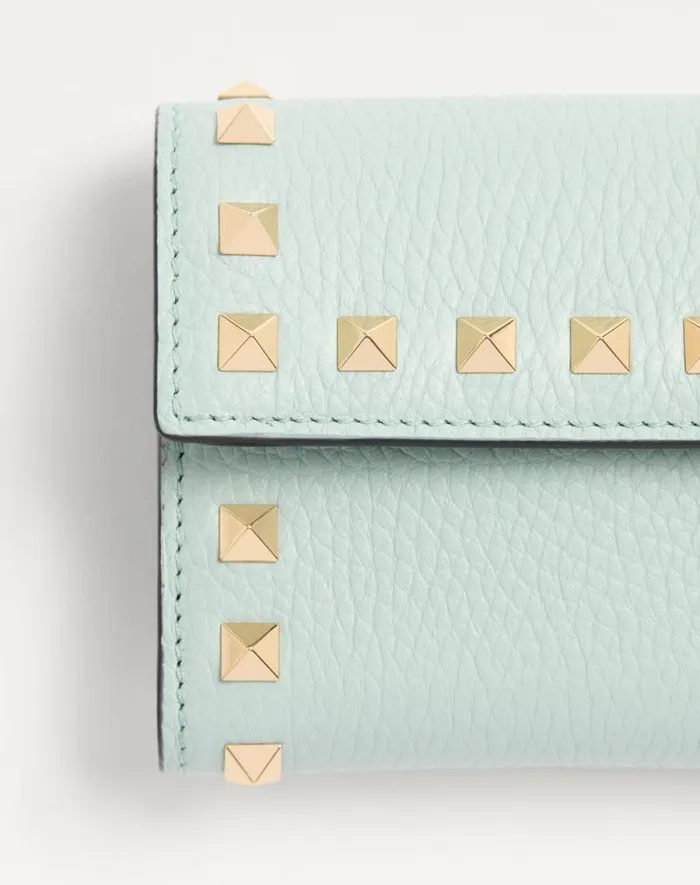 Valentino Wallets And Small Leather Goods Woman Rockstud Trifold Wallet In Grainy Calfskin For Woman In Sky Grey Sky Grey Valentino Wallets And Small Leather Goods Woman Rockstud Trifold Wallet In Grainy Calfskin For Woman In Sky Grey Sky Grey